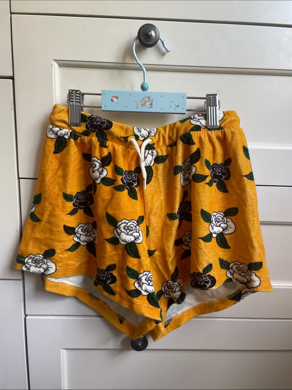Mini Rodini yellow velour floral lounge shorts with green leaves